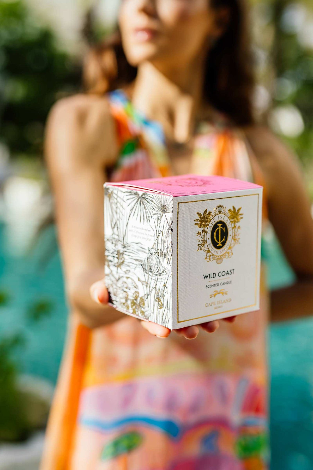 A gift box held out in both hands